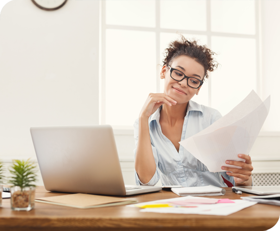 woman-working-laptop-papers